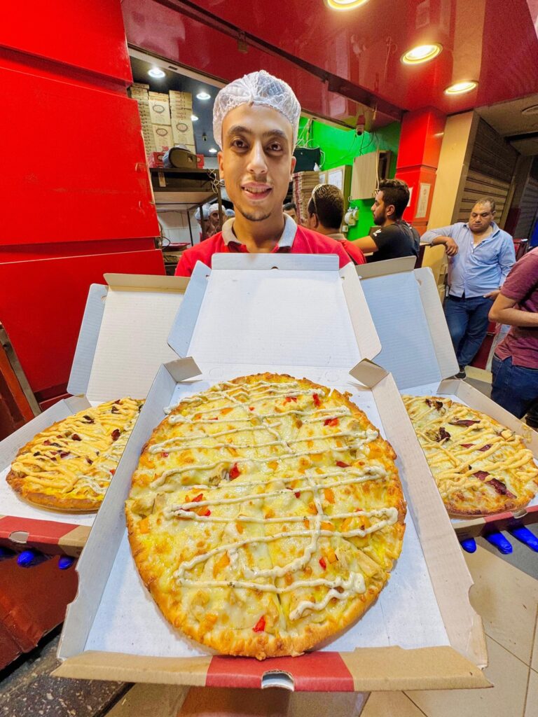 مطعم صلصة أسيوط من مطاعم بيتزا في أسيوط